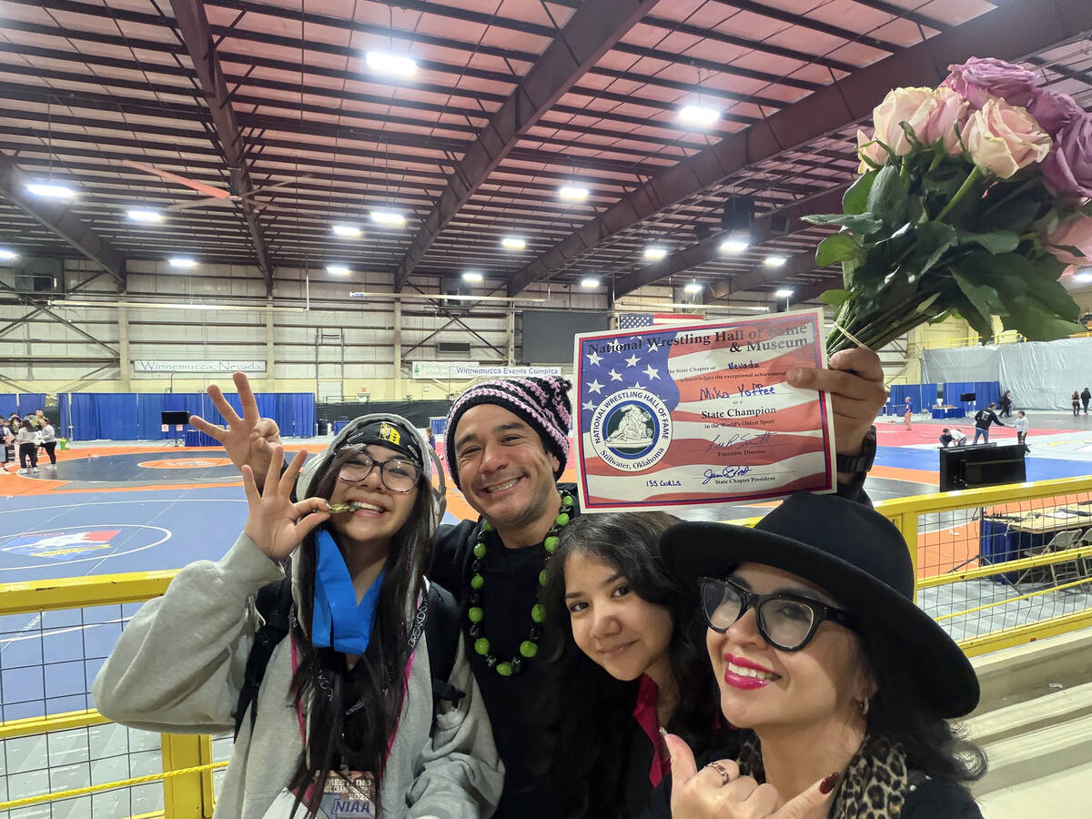 SLAM! senior Mika Yoffee and her parents celebrate her third back-to-back-to-back state titles ...