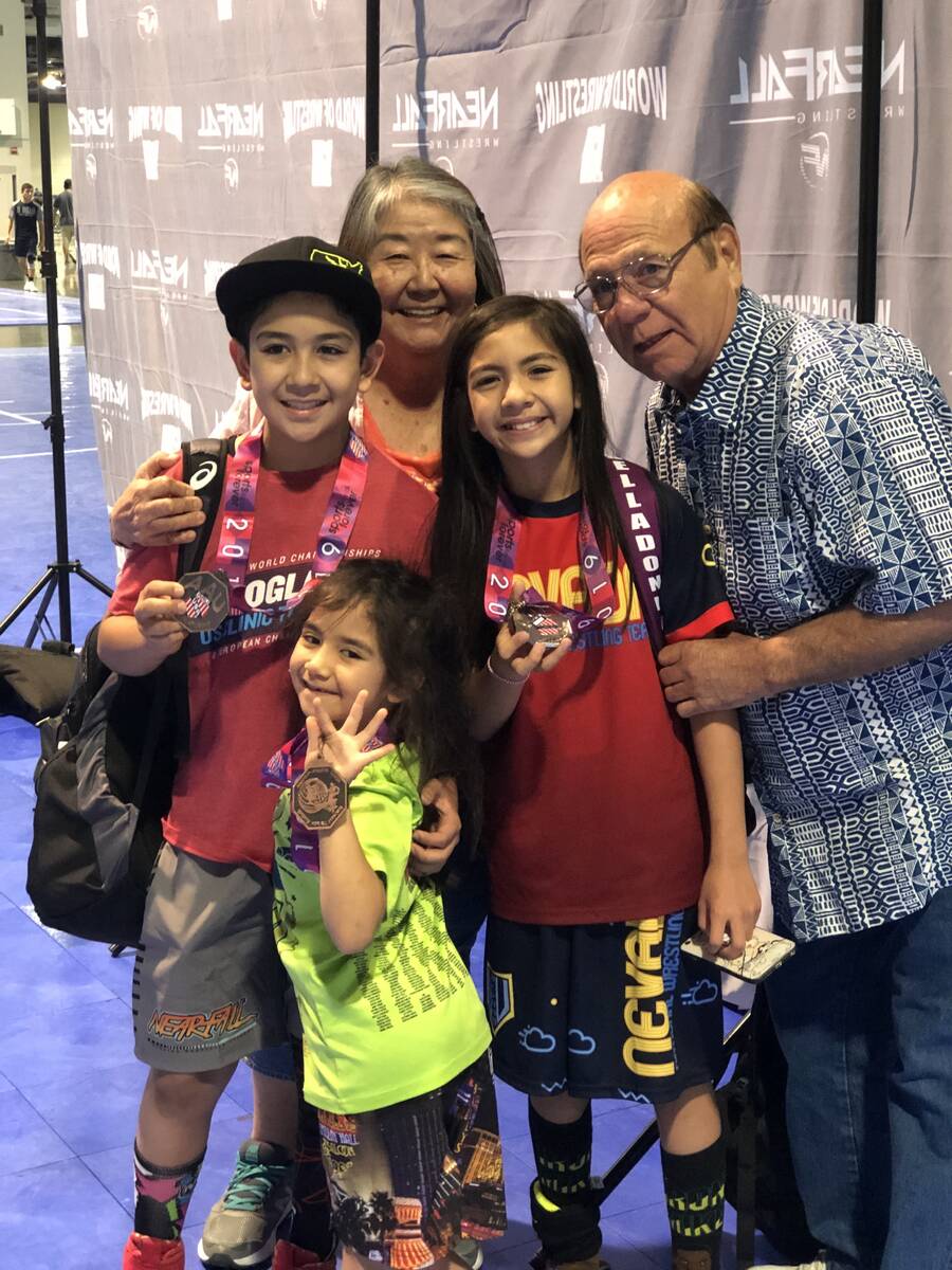 Mika Yoffee celebrates with family following a youth tournament. (Marianne Yoffee/Special to th ...