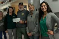 From left: Susie Jackson, volunteer; Rosalee Clasen, vice president of American First National ...