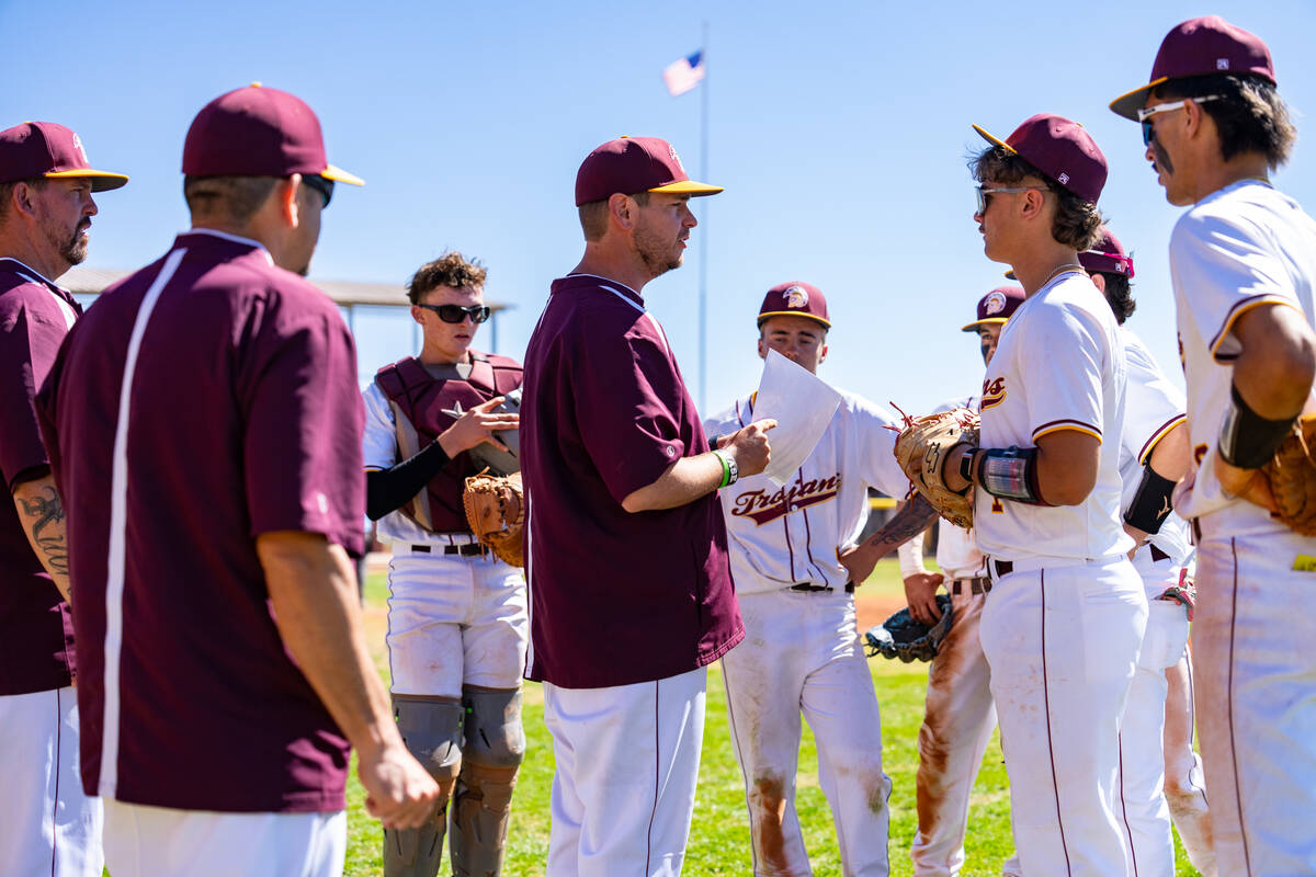 Pahrump Valley High School varsity baseball head coach Drew Middleton gathers the team's attent ...