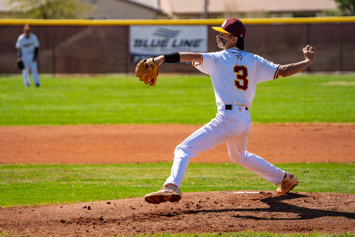 Pahrump Valley High School senior Vinny Whitney hurls an inning of work against Desert Oasis on ...