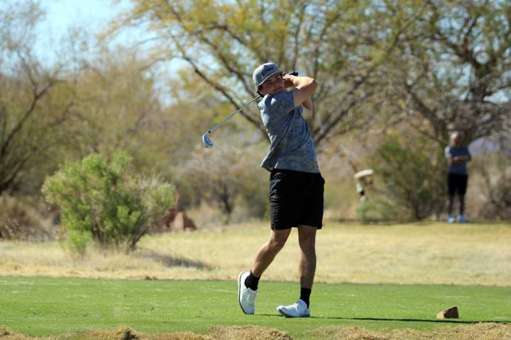 Pahrump Valley High School junior Aaron Riley attempts to finish a hole on the Coyote Run cours ...