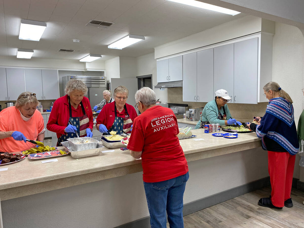 Members of the Disabled American Veterans Auxiliary were busy in the kitchen during the Veteran ...
