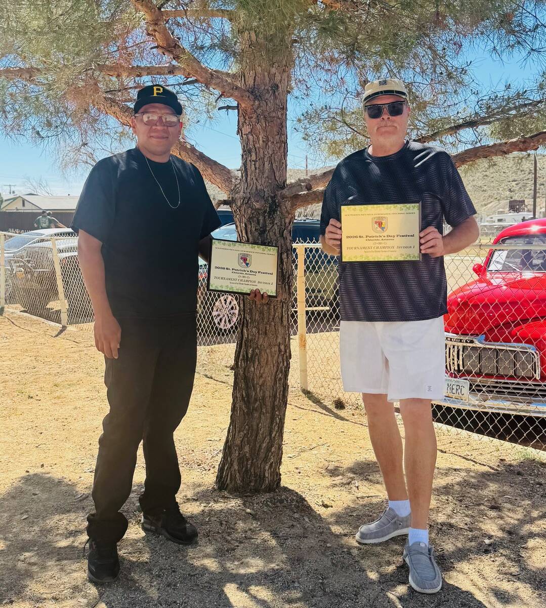 SNHPS pitchers Lathan "Rebel" Dilger and Clint Bender display their first-place certificates du ...