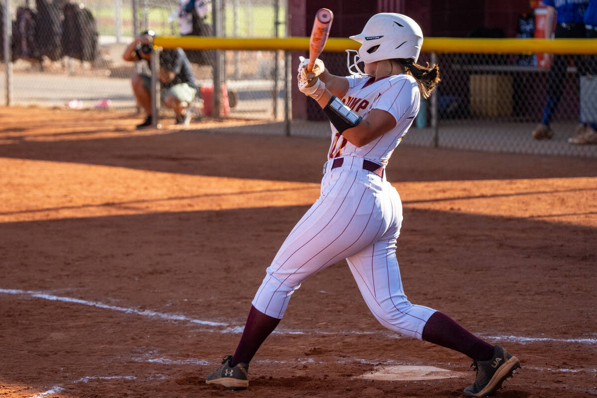 Pahrump Valley High School junior Sadie Freeman rips a ball up the field during the Trojans' ho ...