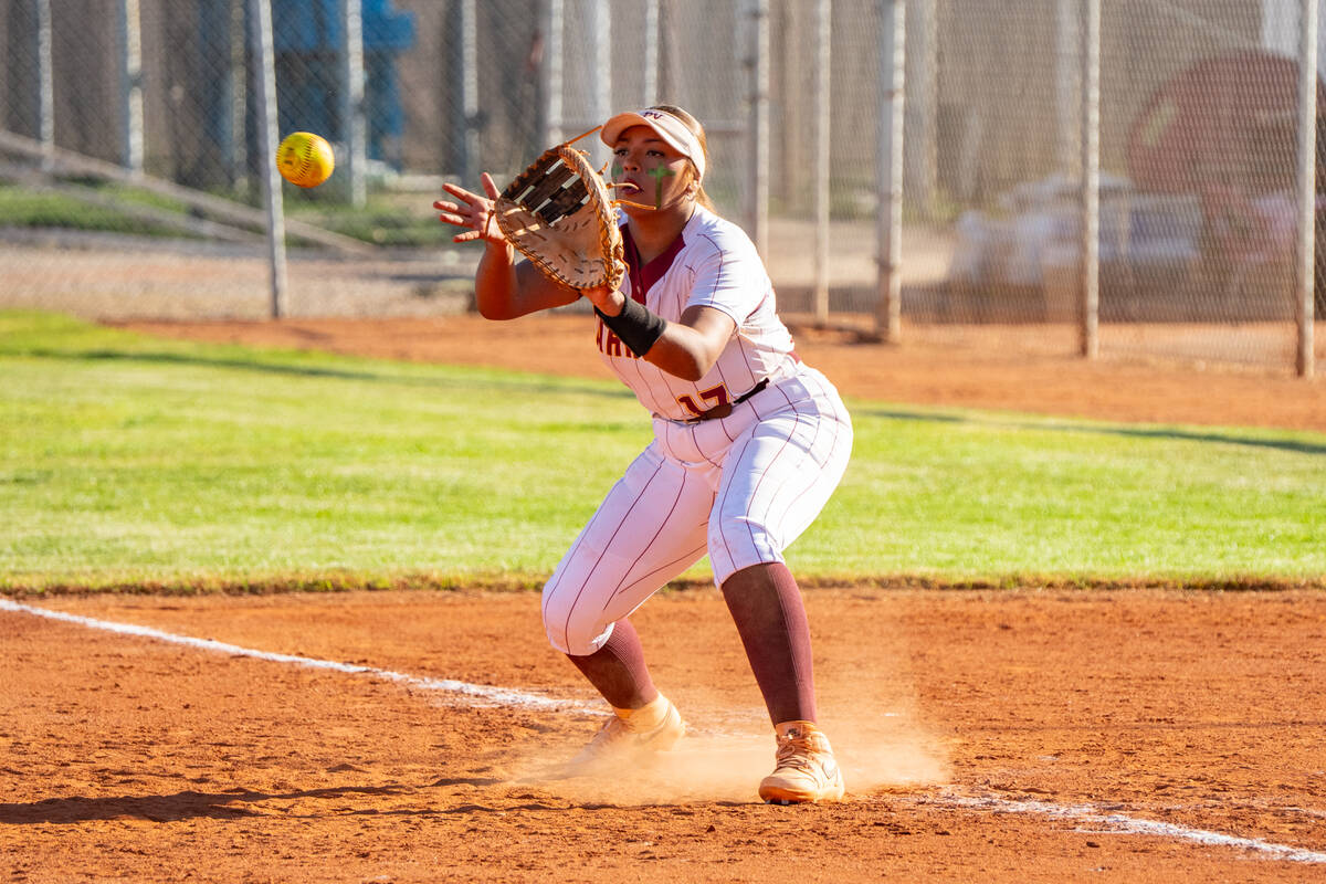 Pahrump Valley High School freshman Jaelyn Rodriguez receives a throw at first base for the out ...