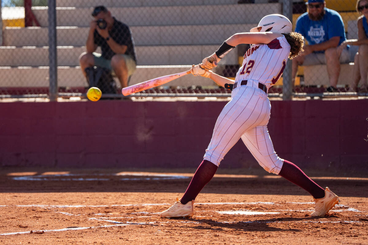Pahrump Valley High School sophomore Mariah Gray puts good bat on the ball during the Trojans' ...