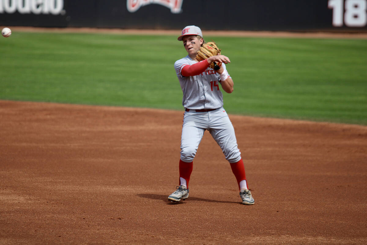 Utah Tech junior second baseman Kyle McDaniel cleanly fields a ball at second base to record th ...