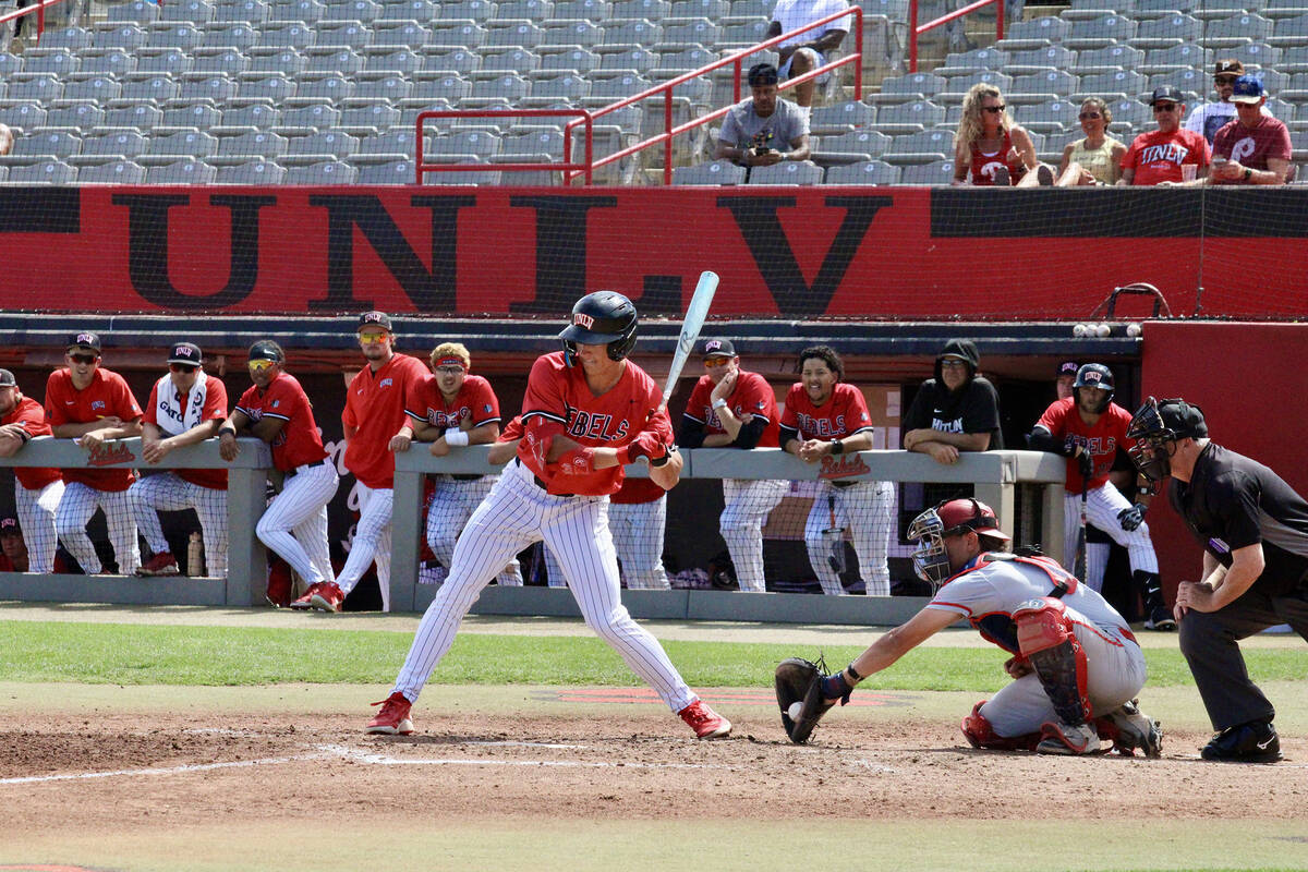 A UNLV player checks his swing during the Rebels' exhibition game against Utah Tech on Sunday, ...