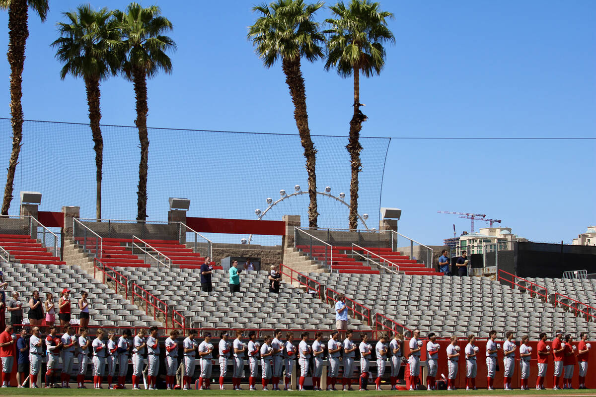 Utah Tech's baseball program lines up for the Pledge of Allegiance prior to the start of their ...