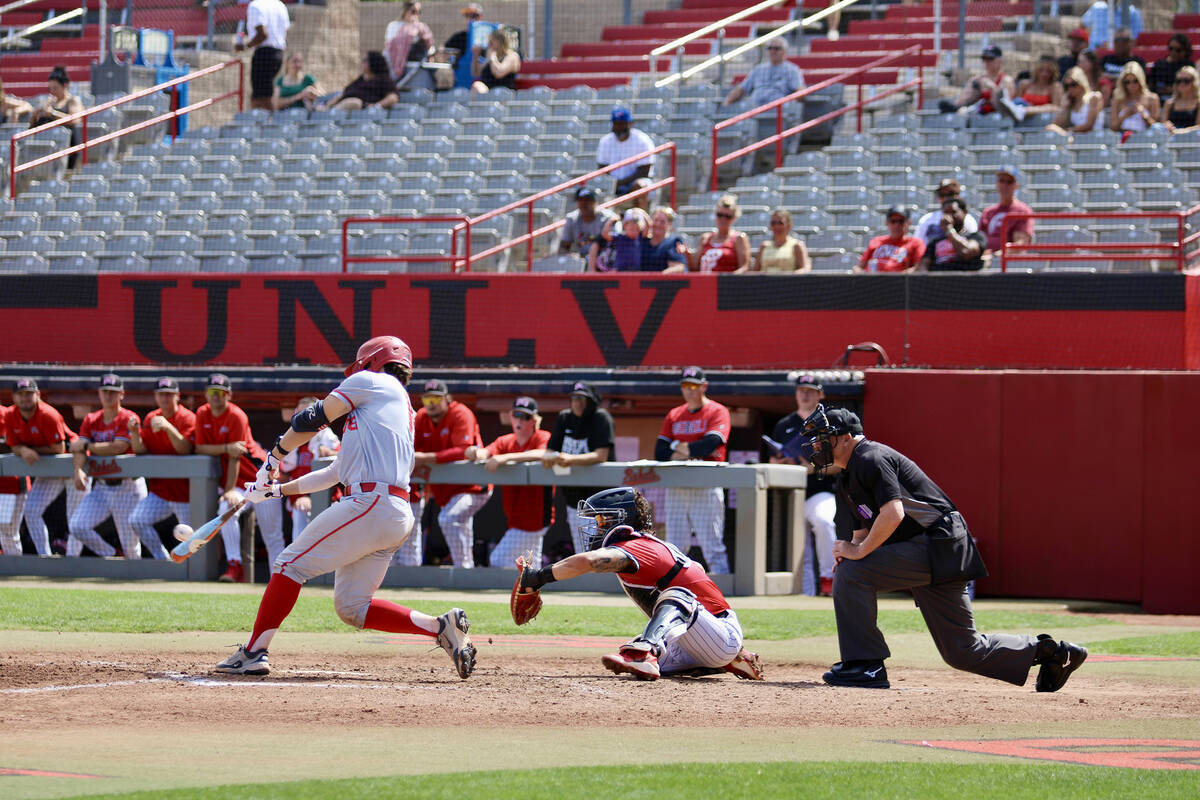 Utah Tech senior catcher Andrew Pyle knocks in an RBI single in the third inning against UNLV p ...