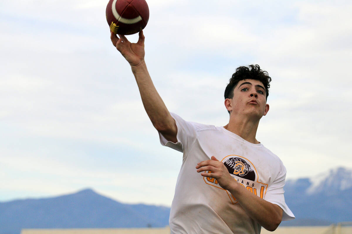 Pahrump Valley High School sophomore quarterback Anthony Montanez lets the ball fly during the ...