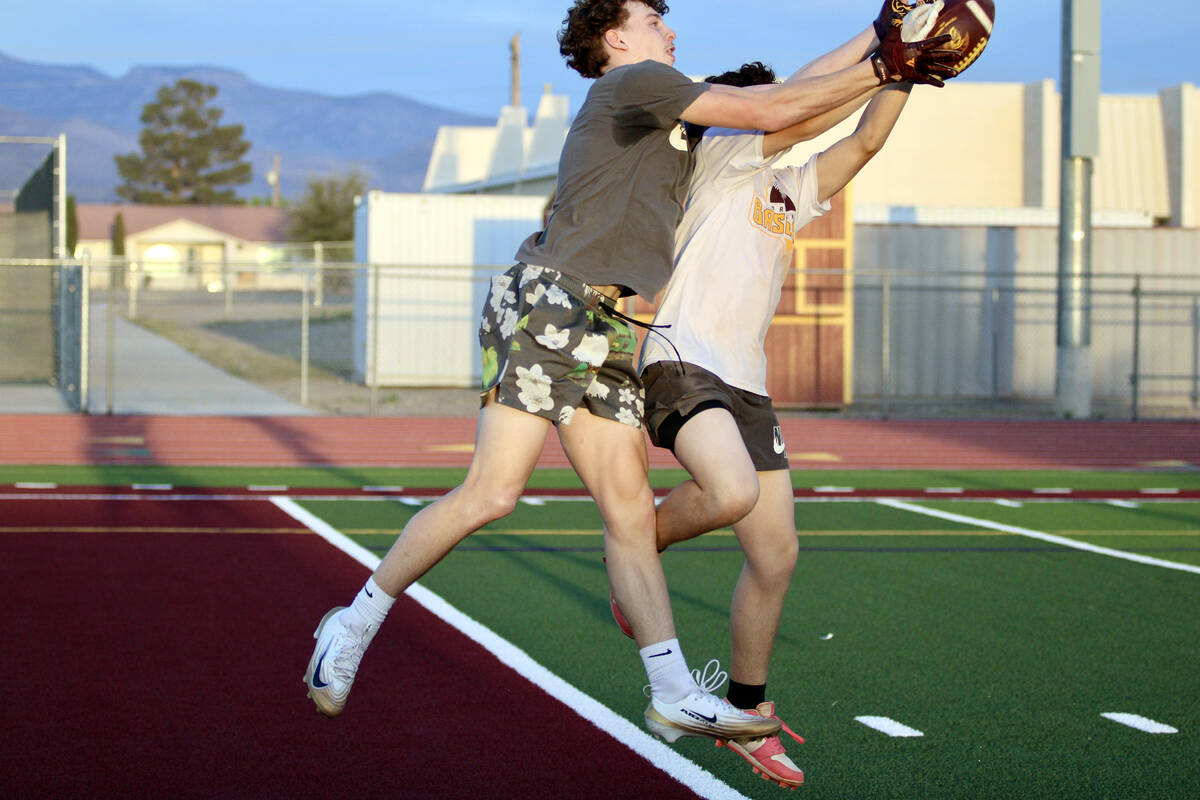 Pahrump Valley High School's Lucas Gavenda and Anthony Montanez fight to maintain position of t ...