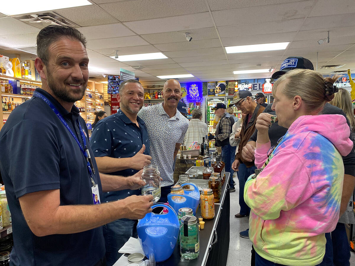 The Johnson Brothers team was on hand to serve up samples of Sugarlands Shine during Liquor and ...