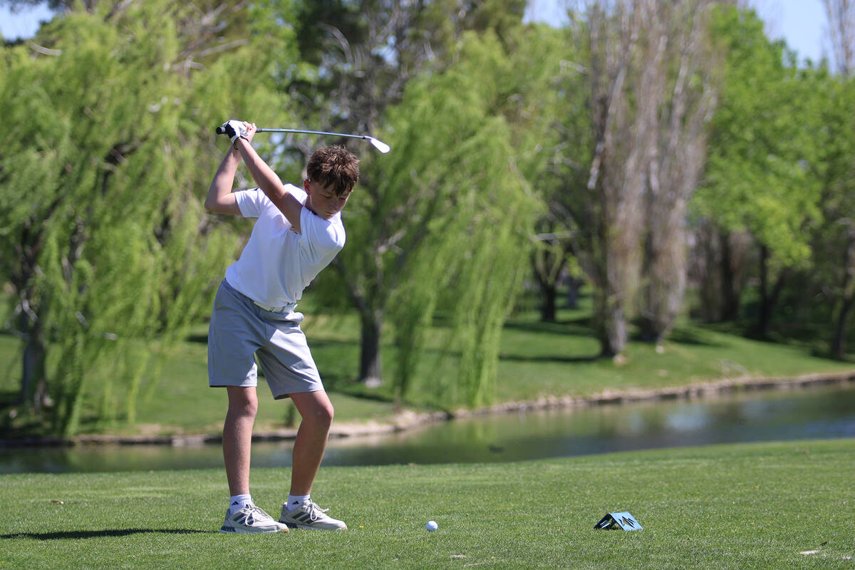 Pahrump Valley High School sophomore Keldan Fredericksen prepares to drive a ball deep on the b ...