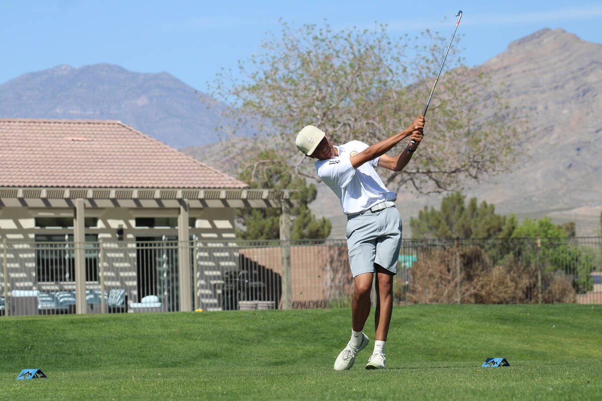 Pahrump Valley High School sophomore Samson Wagner drives a ball deep during the Trojans' home ...