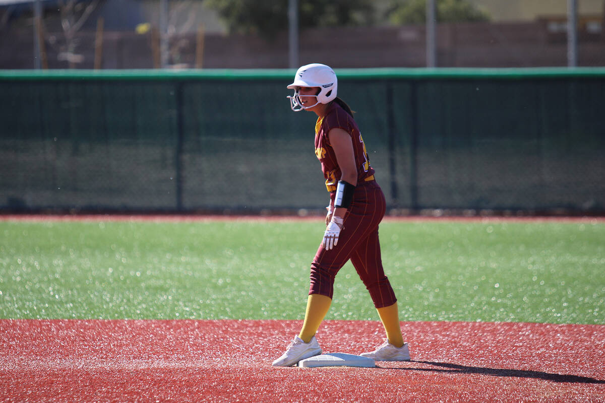 Pahrump Valley High School junior Sadie Freeman reaches second base safely against Green Valley ...