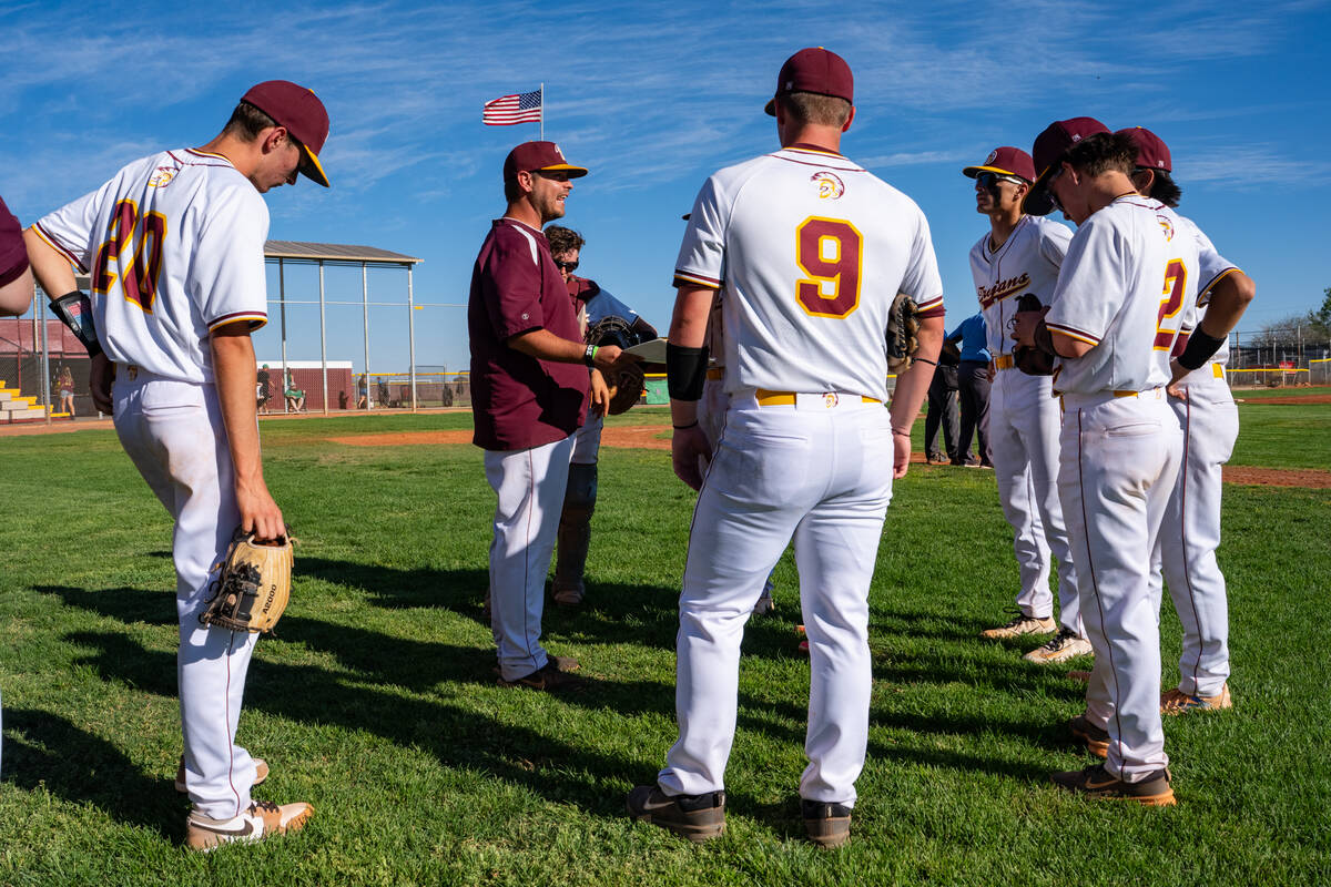 Pahrump Valley High School head coach Drew Middleton talks to the program prior to the start of ...