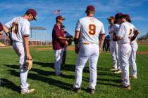 Pahrump Valley High School head coach Drew Middleton talks to the program prior to the start of ...