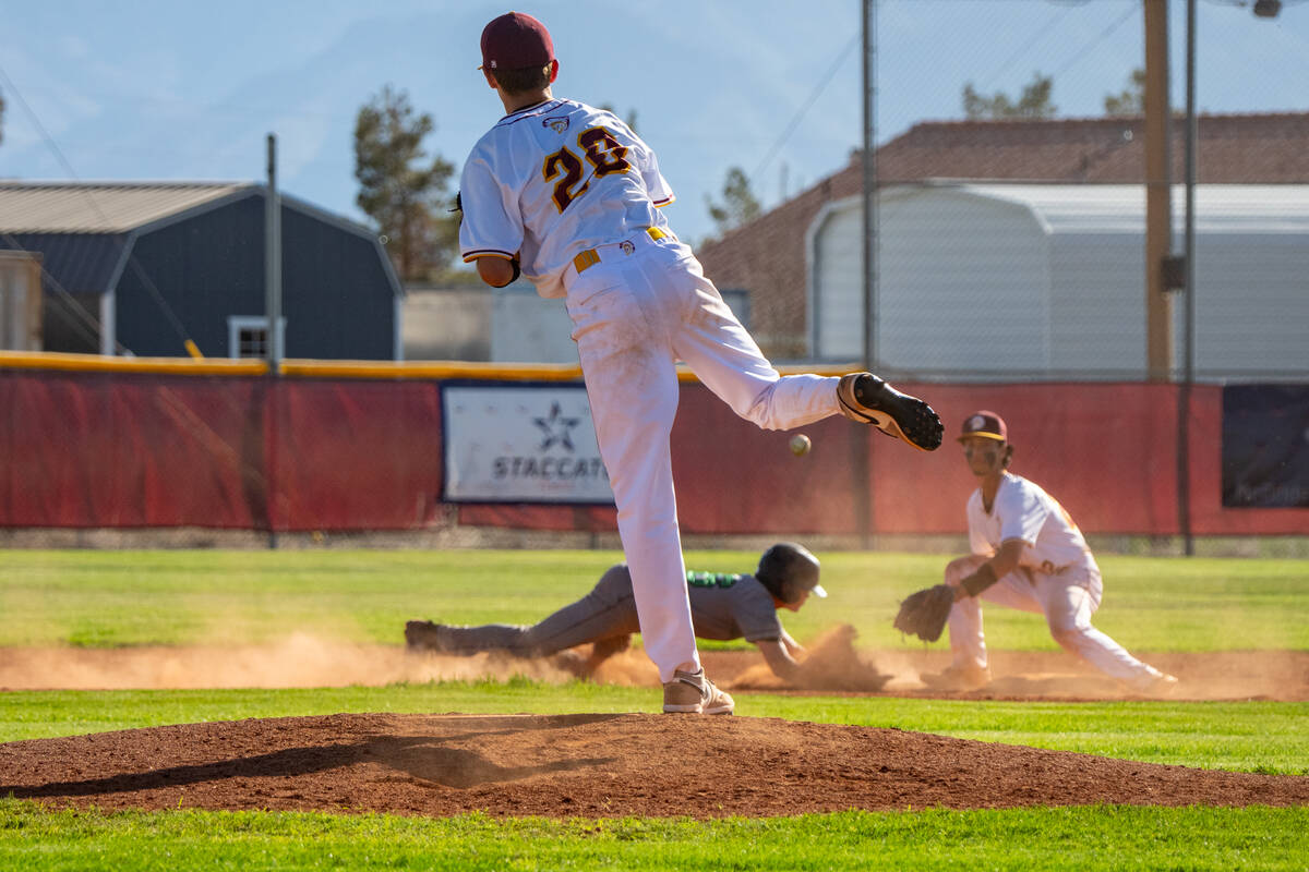 Pahrump Valley High School junior Samuel Mendoza attempts to back-pick a Virgin Valley runner o ...