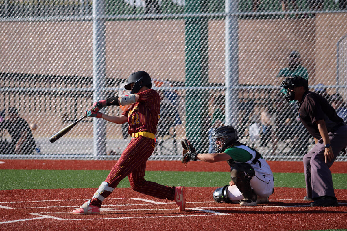Pahrump Valley High School sophomore Anthony Montanez rips a double to left field for an RBI to ...