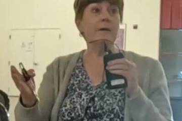 Beatty's Betty Baker challenges Sheriff McGill on limited police equipment for Beatty. (Thomas ...