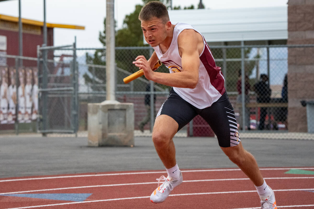 Pahrump Valley High School senior Joshua Slusher competes in the 4x400 Relay during the Pahrump ...