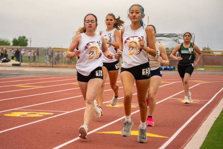 Pahrump Valley High School juniors Kaylan Robinson and Sophie Romero compete during the Pahrump ...