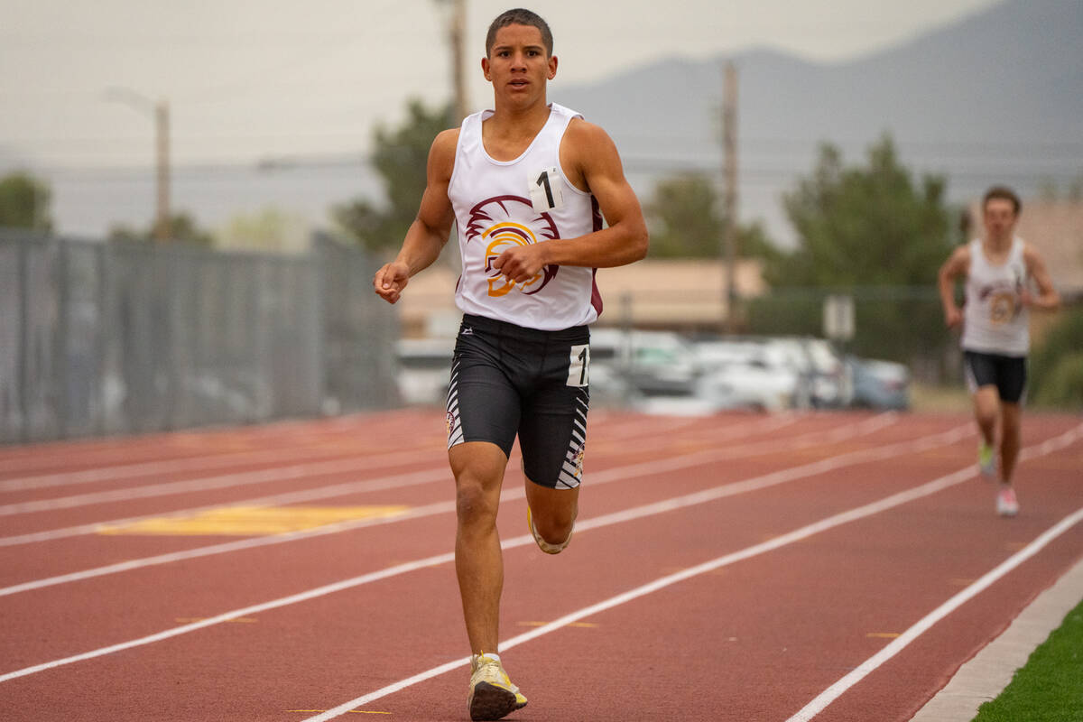 Pahrump Valley High School senior Joaquin Flores clears some distance during the Pahrump Weekda ...