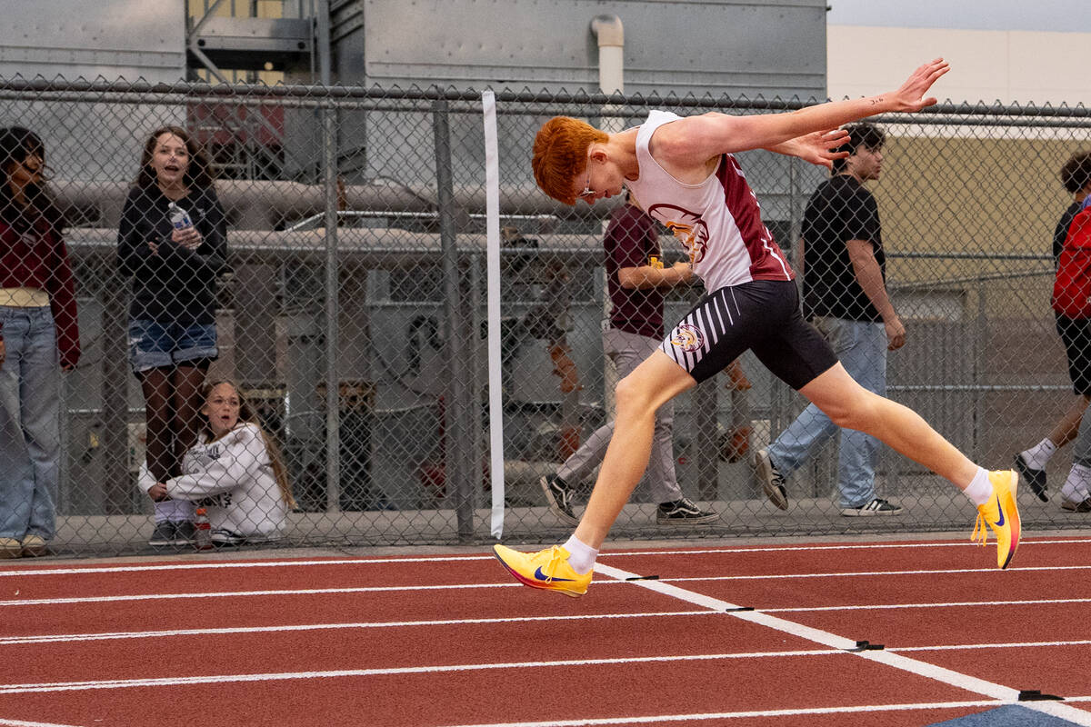 Pahrump Valley High School sophomore track and field competitor Joshua Gent races to the finish ...