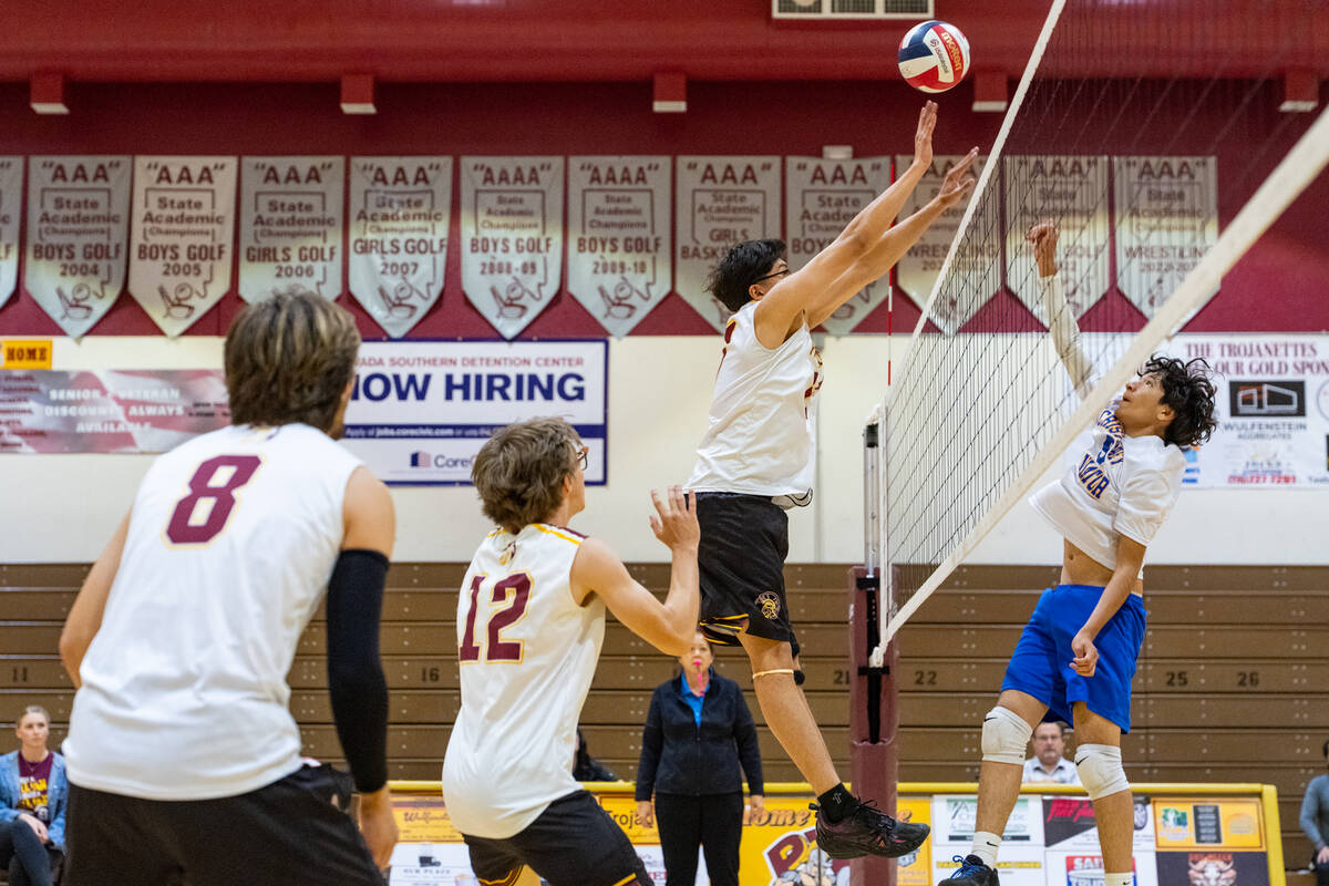 Pahrump Valley High School senior Andy Sanchez attempts a block on Cristo Rey St. Viator during ...