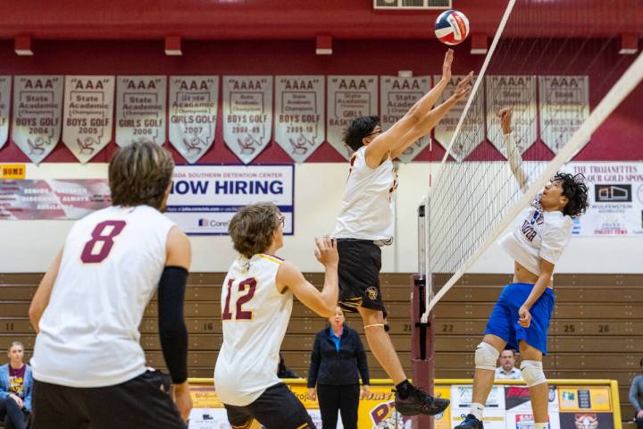 Pahrump Valley High School senior Andy Sanchez attempts a block on Cristo Rey St. Viator during ...