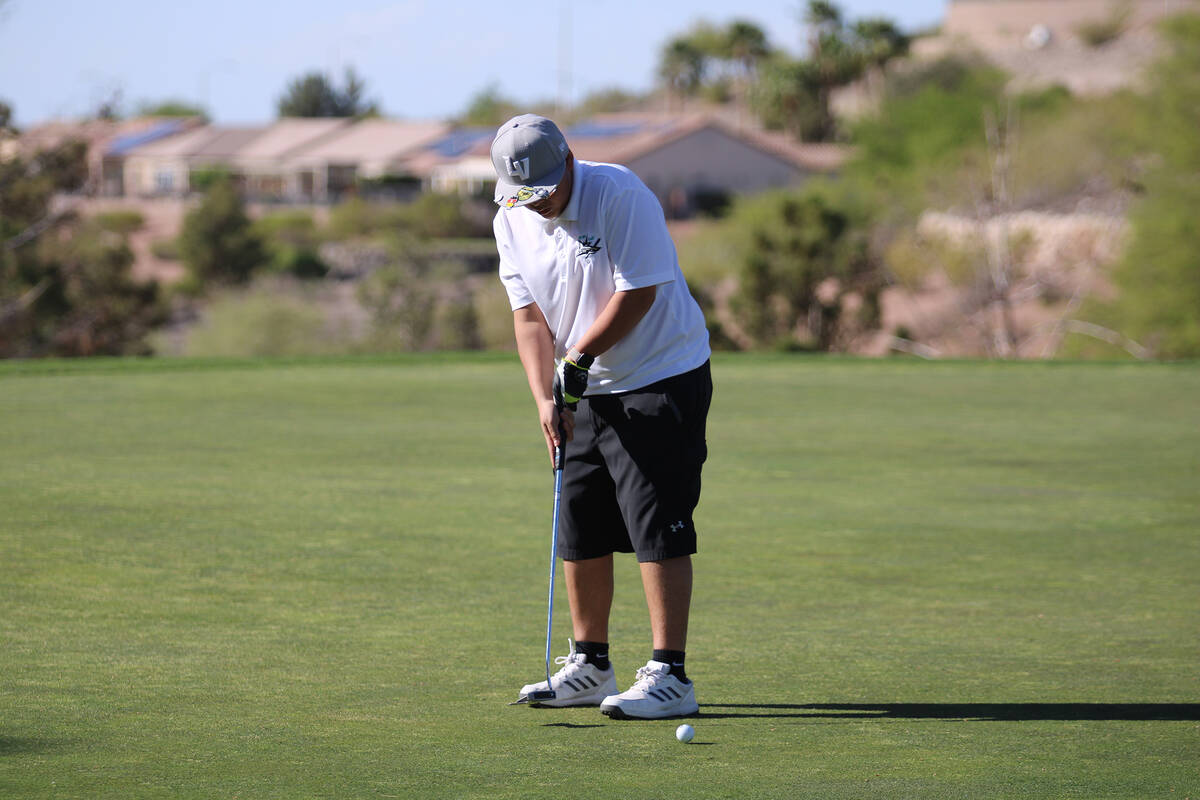 Rosemary Clarke Middle School seventh-grader Jacob De Santiago attempts a putt to finish his r ...