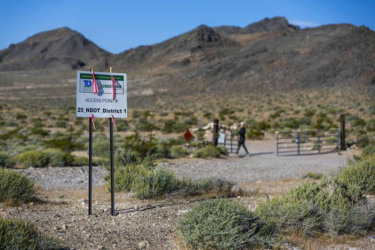 A sign for Greenlink construction marks a gated entry to the Rock Valley Wash and proponents se ...