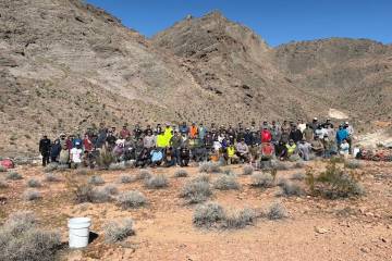 Many wildlife conservation groups gathered together to build a "guzzler," to supply drinking wa ...