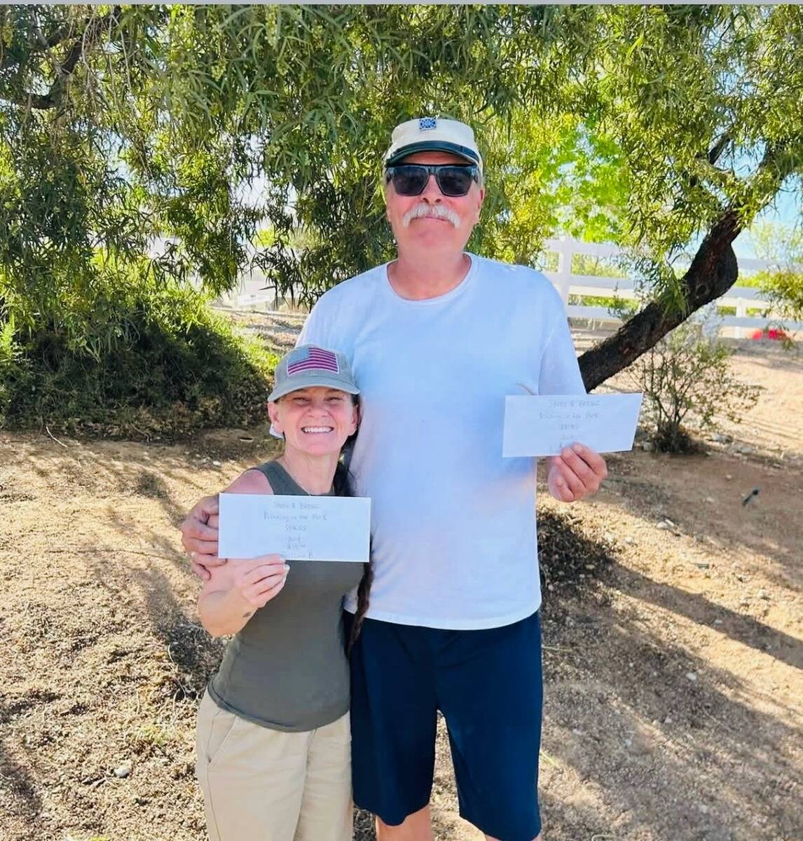 Shoes $ Brews division A and division B champions Lathan (Reb) Dilger and Danielle Workman cele ...