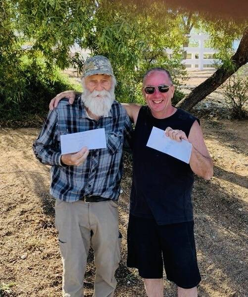 Shoes $ Brews division C winners Lawrence Workman and Joe Kalache celebrate during Easter Sunda ...