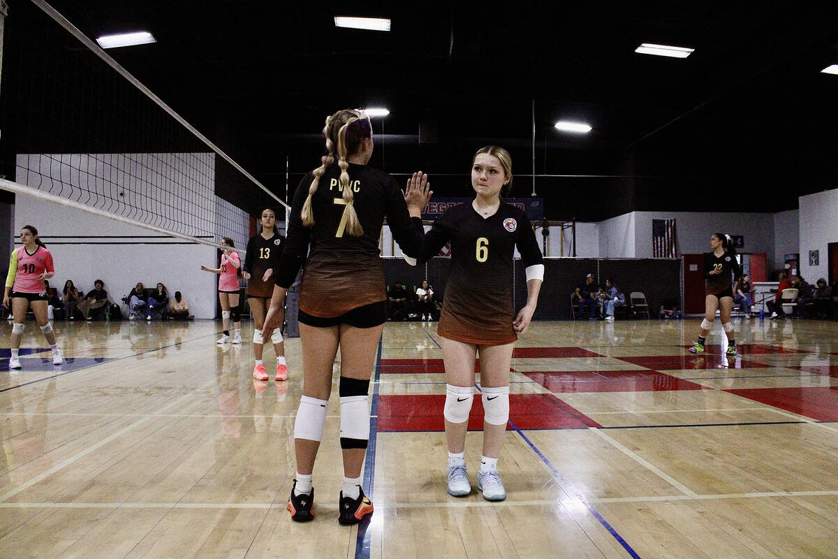 Pahrump Valley Volleyball Club teammate Emri Wulfenstein checks into the match for Daisy Skouga ...