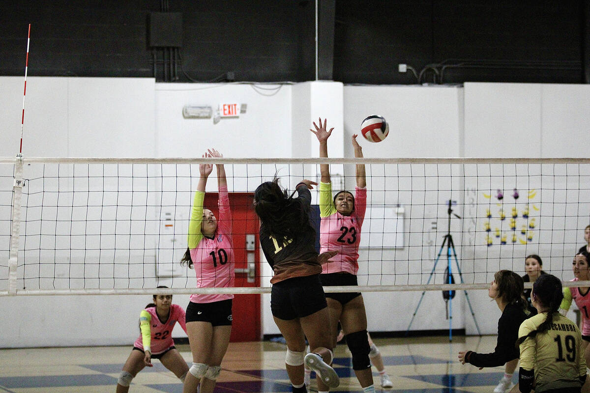Pahrump Valley Volleyball Club's Miani Freitas-Faamai sends a kill over the net against Tstreet ...
