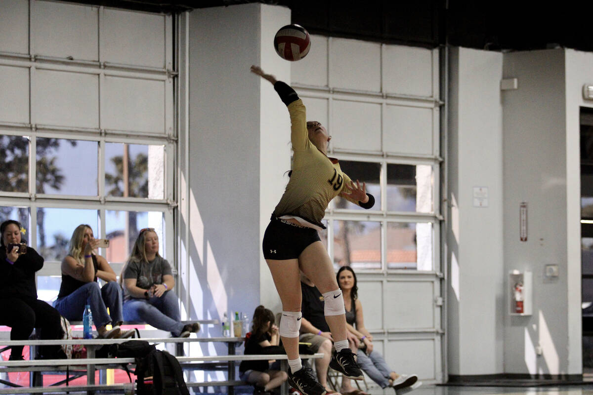 Pahrump Valley Volleyball Club libero Mahina Decambra prepares send a serve over during the clu ...