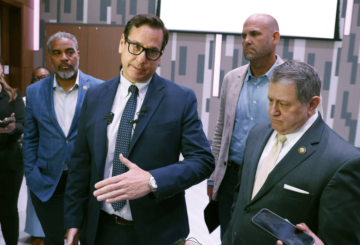 Nevada Secretary of State Francisco Aguilar addresses the media as U.S. Congressman Steven Hors ...