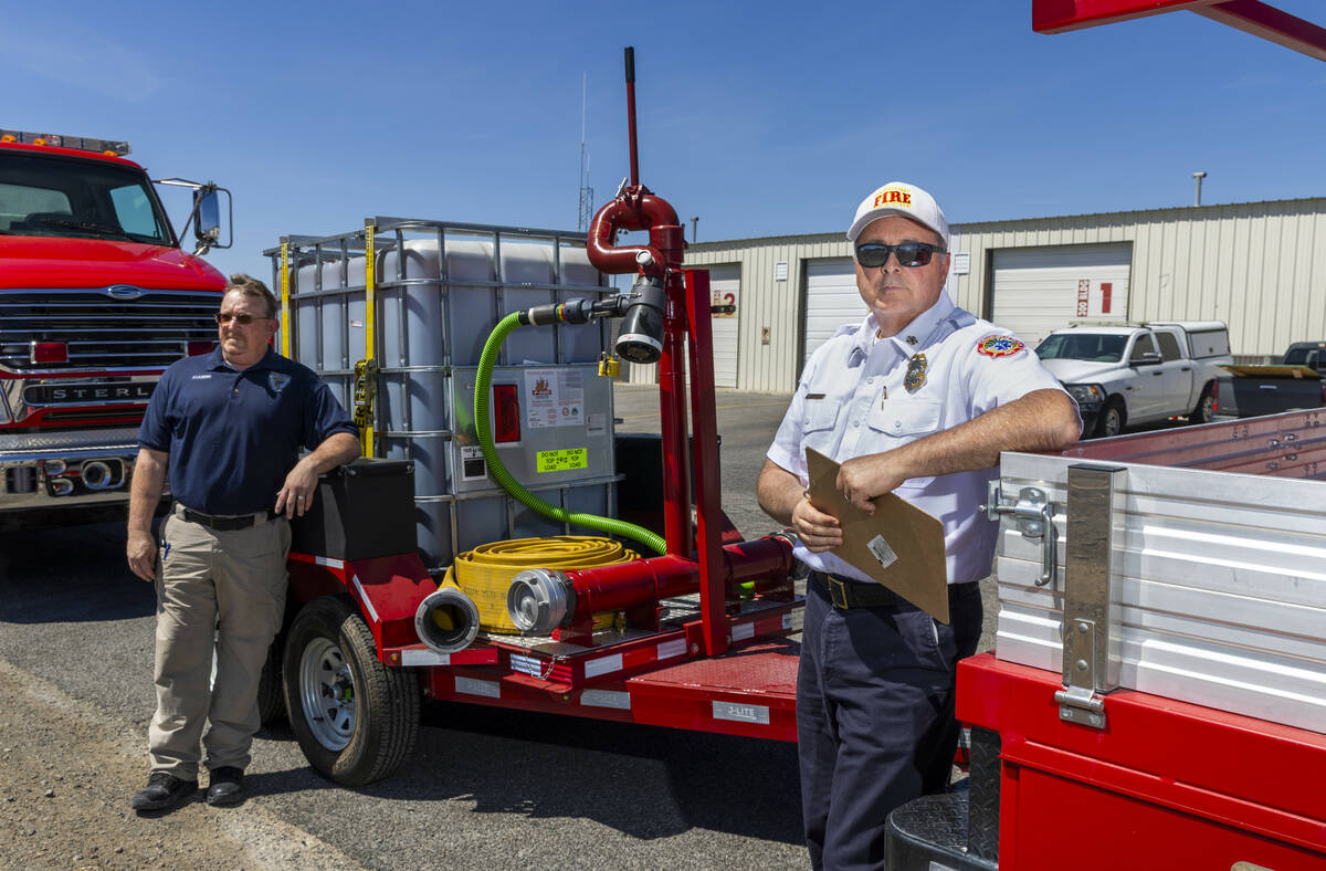 Nye County Emergency Management Director Scott Lewis right, with Administrative Assistant Patri ...