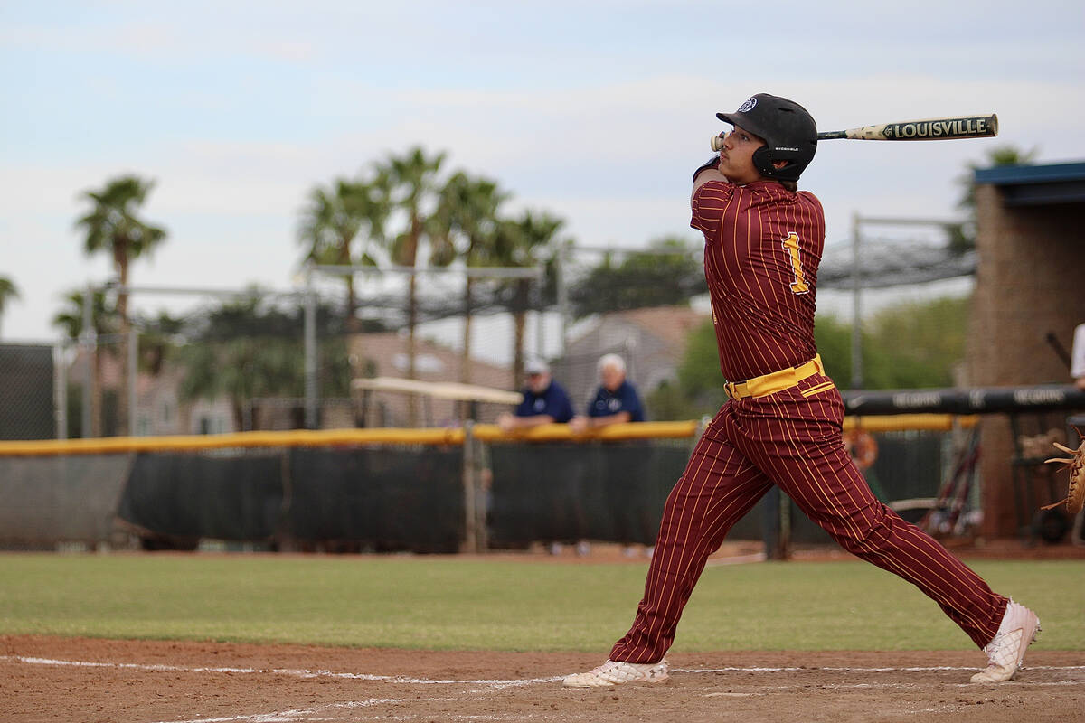 Pahrump Valley High School sophomore CJ Nelson follows through his swing in his at-bat against ...