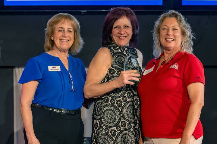 Shelley Fisher, center, owns and operates Shelly Belly NY Bagels in Pahrump, which was recently ...
