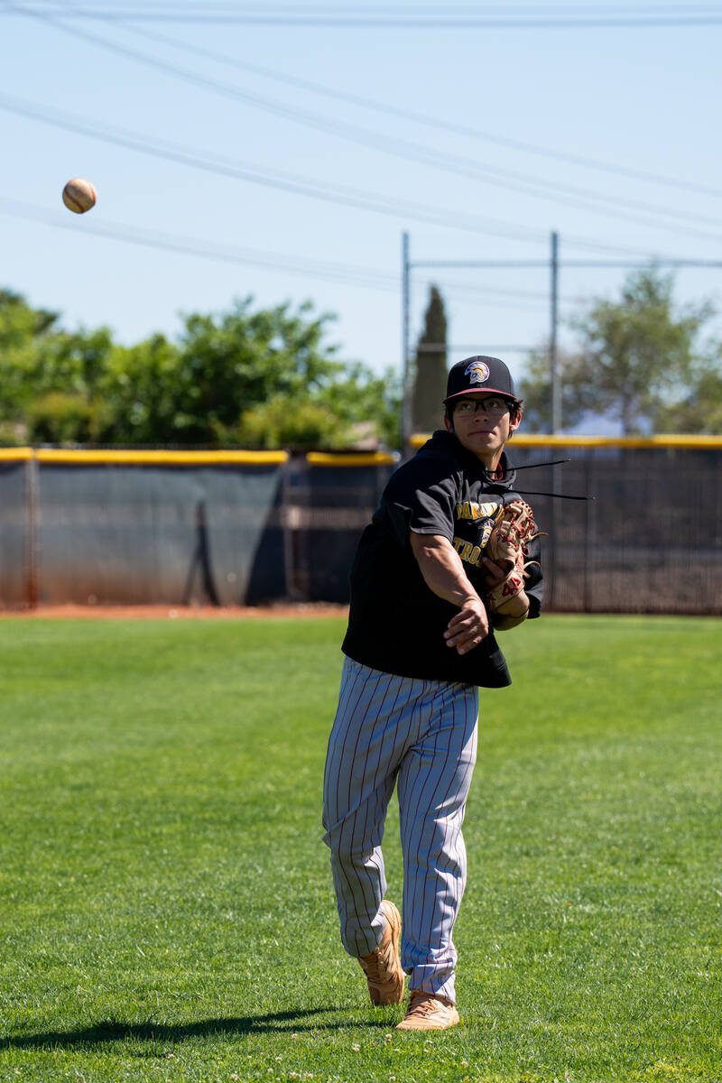 Pahrump Valley High School senior Dominik Wilson warms up prior to the start of Pahrump Valley' ...