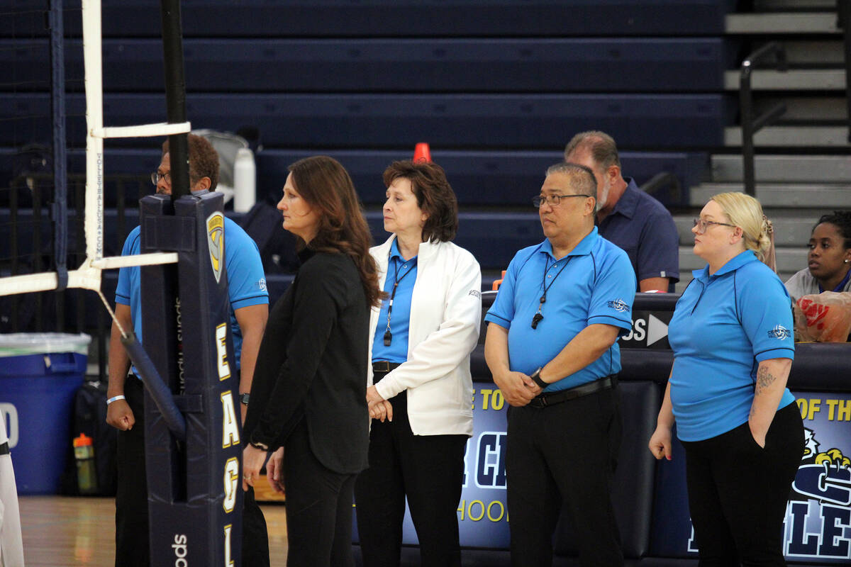 Pahrump Valley High School's varsity boys volleyball head coach Amber Lugo looks with the offic ...