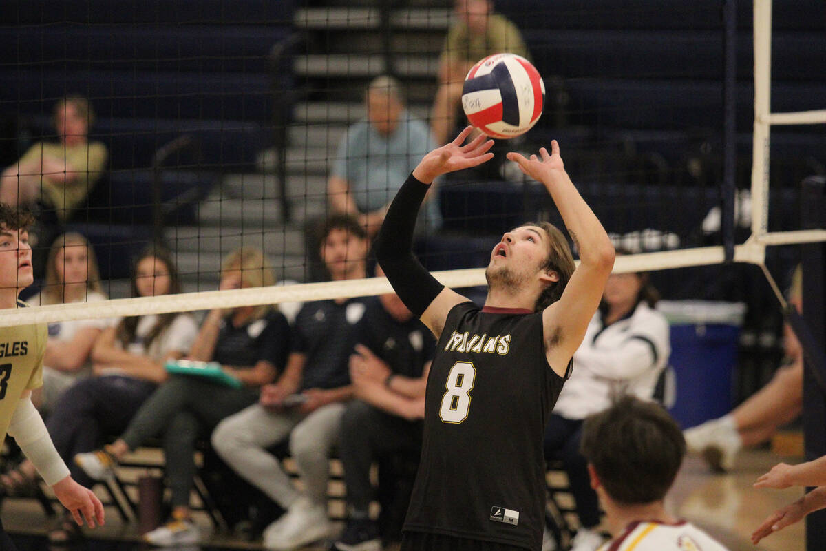 Pahrump Valley High School senior Elijah Thompson attempts to set a pass for his teammates duri ...