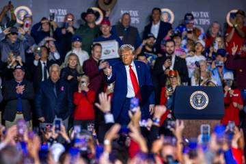 President Donald Trump gives a thumbs up to supporters following his speech at the Circa on Sat ...