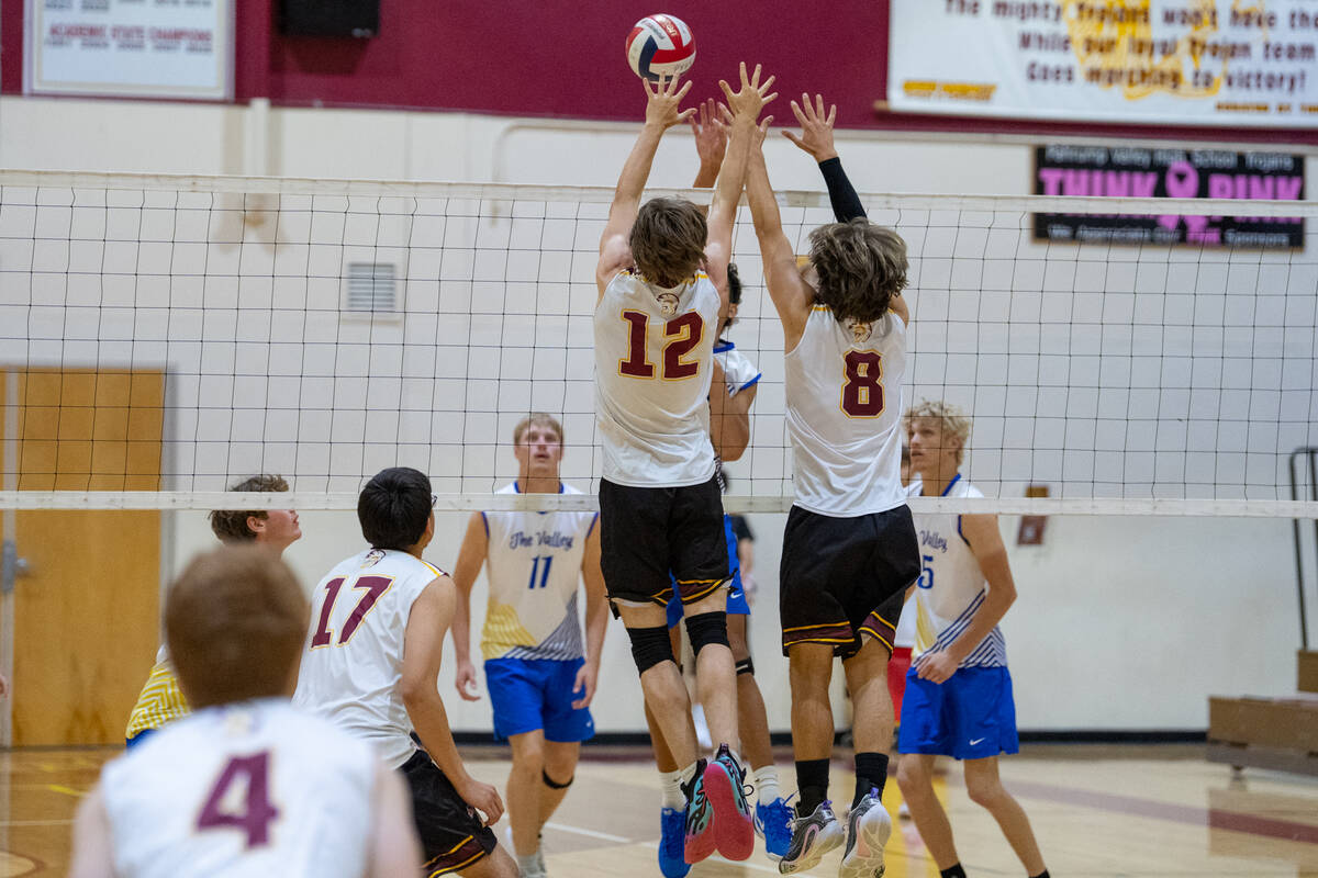 Pahrump Valley High School seniors James Wilson and Elijah Thompson combine to form a wall agai ...