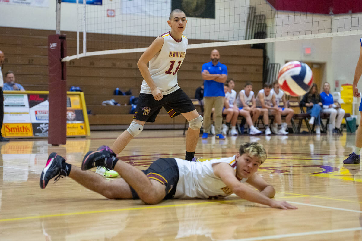 Pahrump Valley High School senior Elijah Thompson extends out in a diving effort during the Tro ...